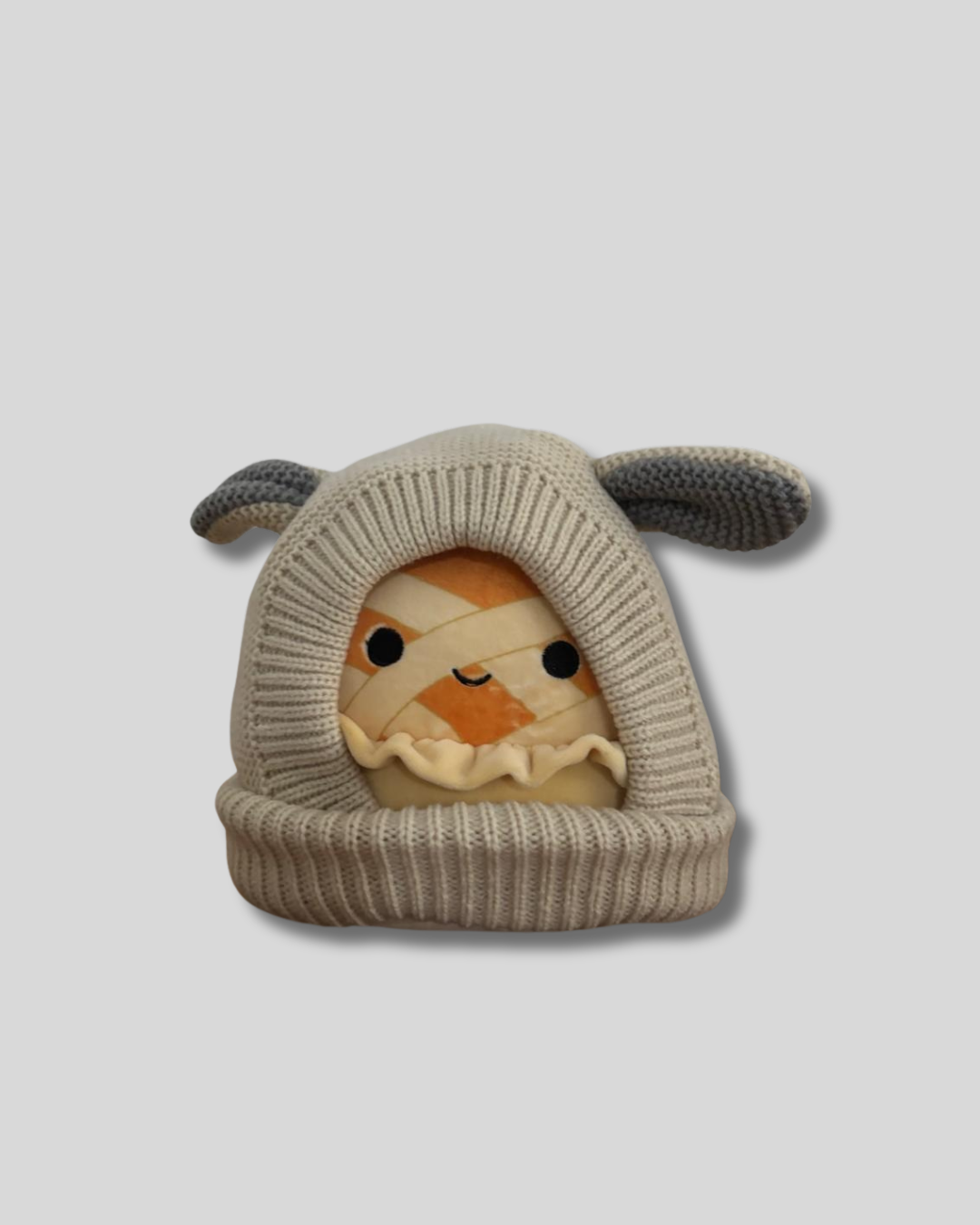 Gorros tejidos crema orejón