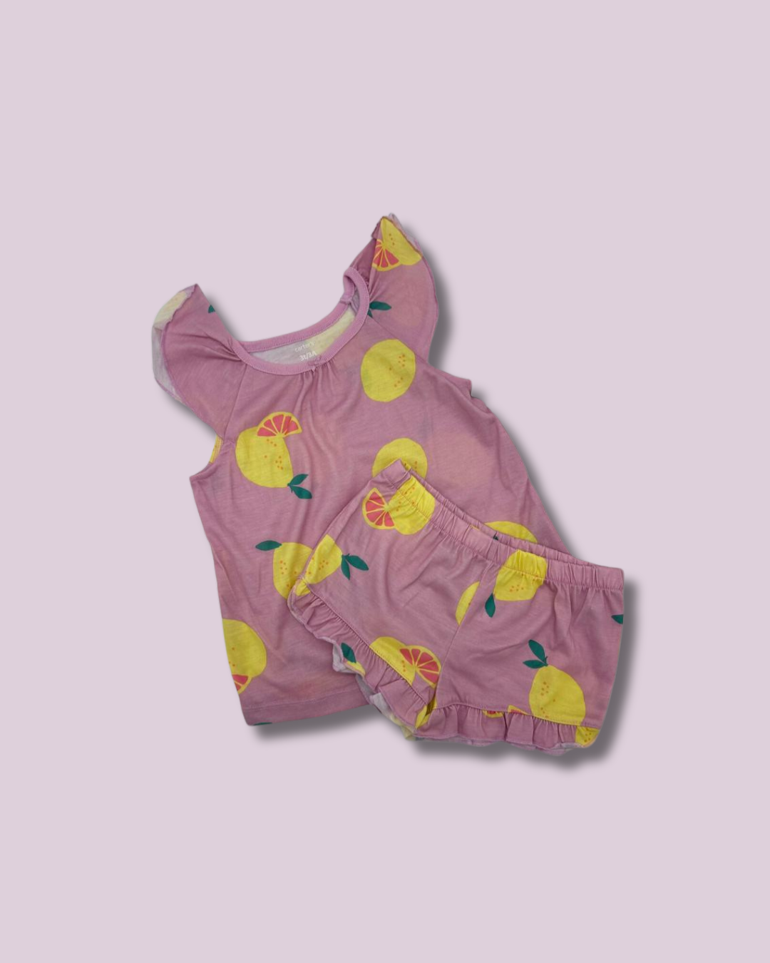 Pijama lila con frutas y volantes