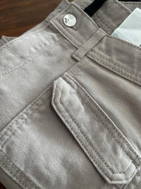 Jean corte bajo y bota ancha